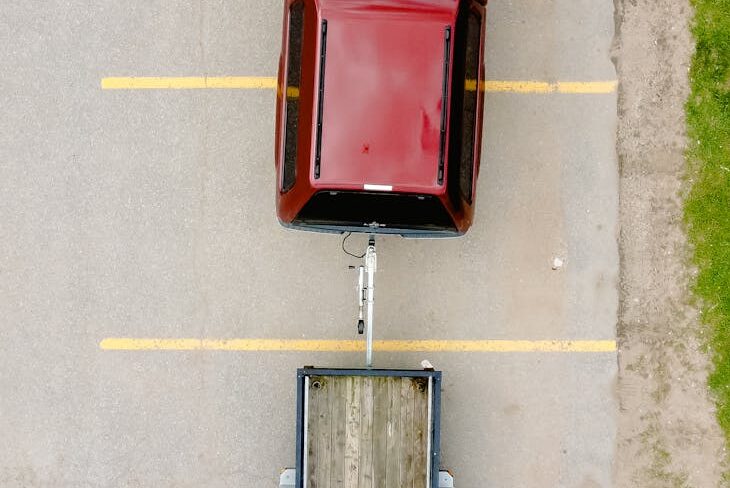 car with trailer on parking lot